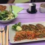 Main course with salad as a side dish in Artha Porec